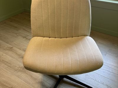 Beige Upholstered Office Desk Chair with Black Metal Swivel Base