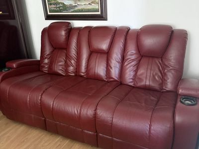 Red Leather Reclining Sofa with Cup Holders. Electric