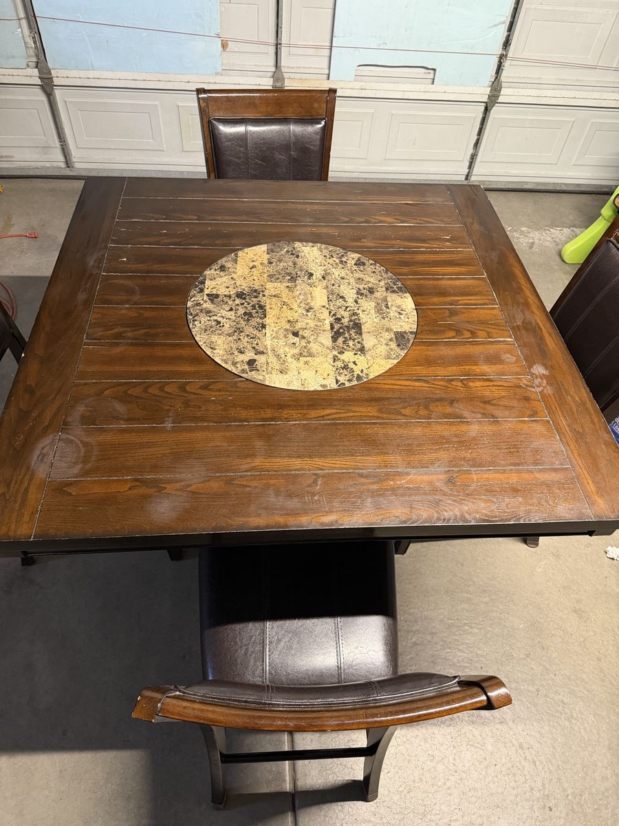 Table with 4 chairs and lazy Susan in the middle