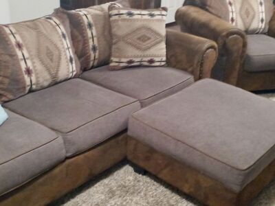 partial leather and native print couch and chair