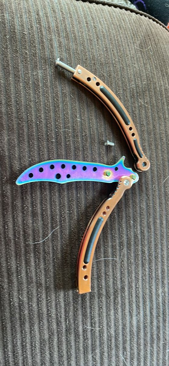 Practice butterfly knife (needs repair)