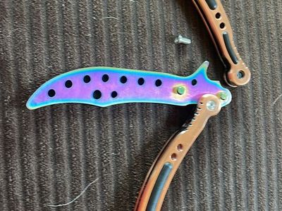 Practice butterfly knife (needs repair)