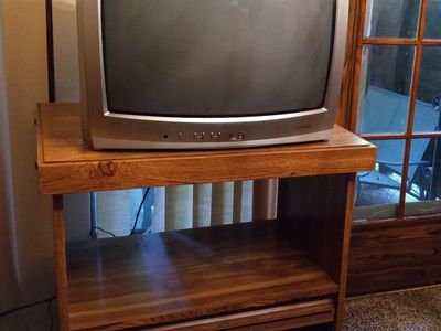 SMALL CONSOLE TV CONNECTED TO COMCAST