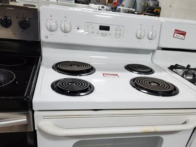 NICE GE COIL TOP RANGE! WITH A FULL WARRANTY