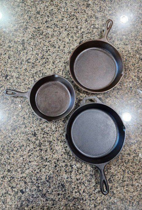 Set of 3 Lodge Cast Iron Skillets - Two 10" and one 8".