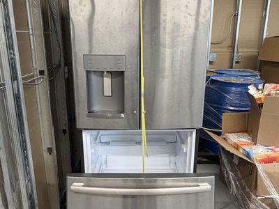GE Stainless Steel French Door Refrigerator with Bottom Freezer and Water/Ice Dispenser