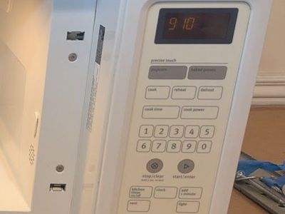 Maytag MMV1164WW-2 1000w over range microwave oven 1.6 cu feet