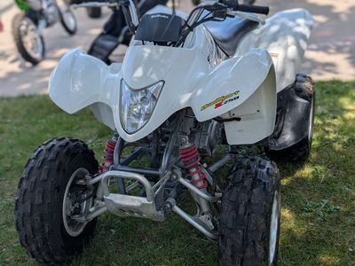 Multiple four wheelers and a motorcycle