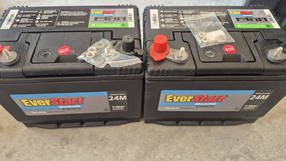 2 everstart marine batts and boxes