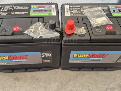 2 everstart marine batts and boxes