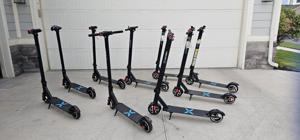 ($99 Take All of them) Unused Hover-1 Electric Folding Scooters -$99 for the Whole Lot of 9 Black Electric Scooters ( Non-workin