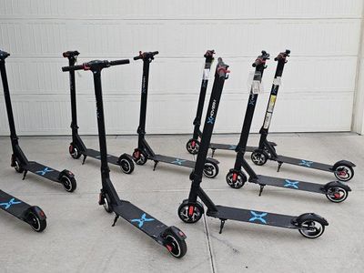 ($99 Take All of them) Unused Hover-1 Electric Folding Scooters -$99 for the Whole Lot of 9 Black Electric Scooters ( Non-workin
