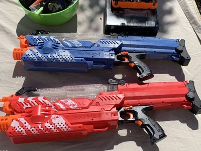 pair of nerf nemesis with battery pack, darts and googles
