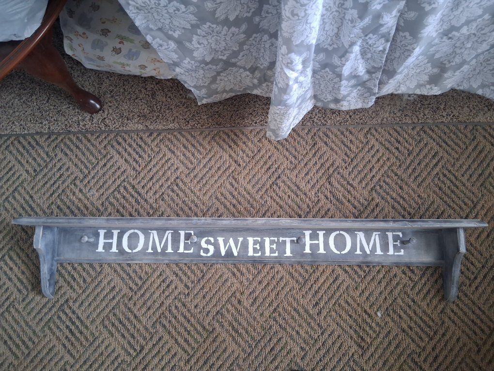 hand made and painted Coat hanger