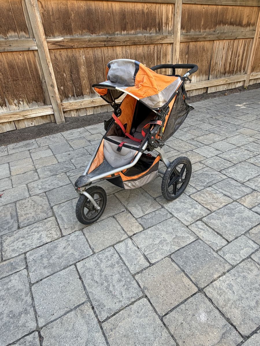 BOB Revolution Single Jogging Stroller - Orange/Gray, Air-Filled Tires, Reclining Seat, Hand Brake