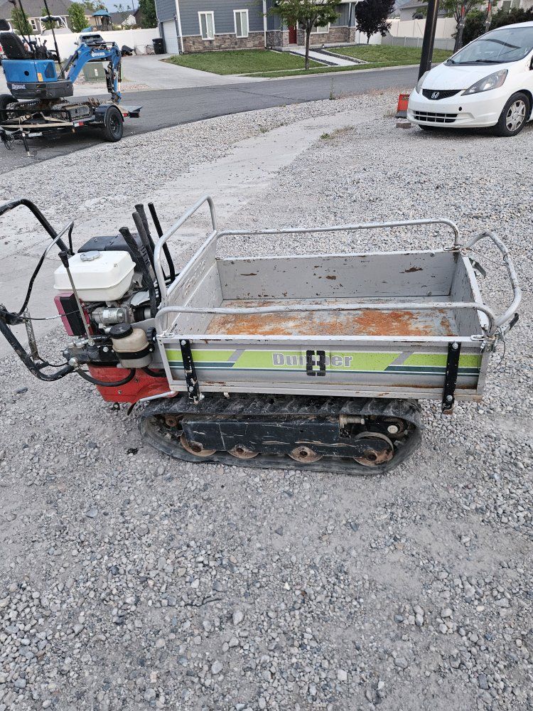 Gas powered track wheel barrel