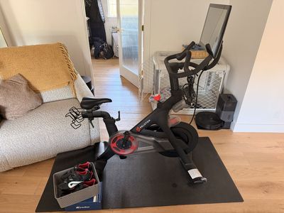 Peloton Bike with Swivel Screen, Shoes & Mat - $450