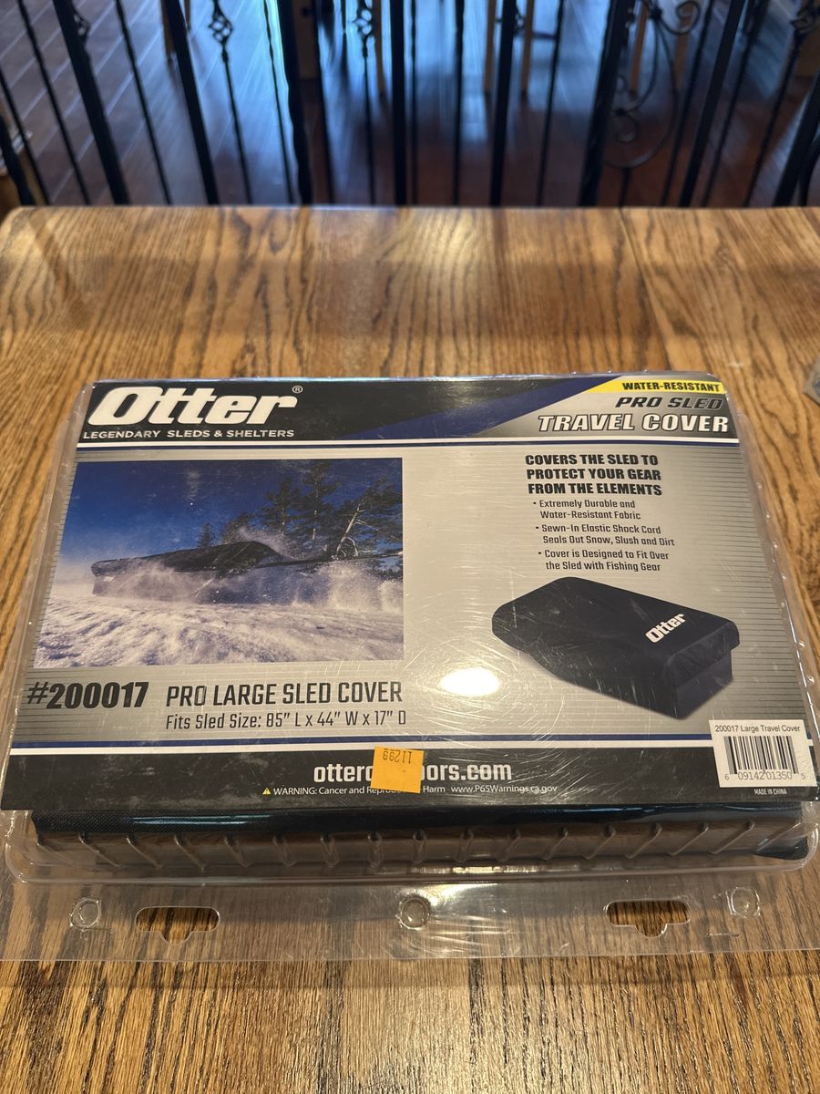 Otter brand ice fishing sled cover. Ice fishing