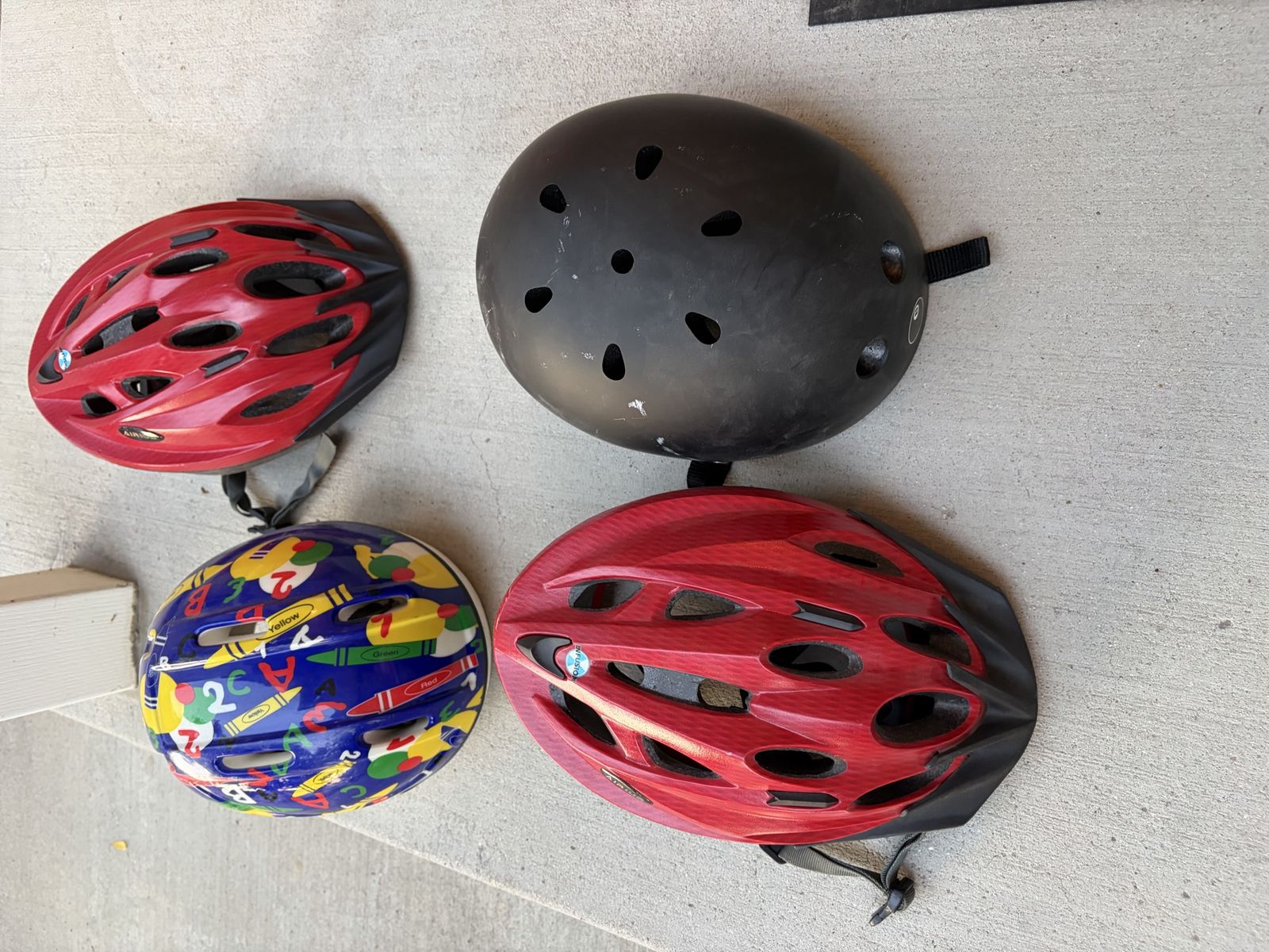 Lot of 4 Assorted Bicycle Helmets - Youth Sizes