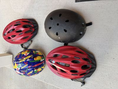 Lot of 4 Assorted Bicycle Helmets - Youth Sizes