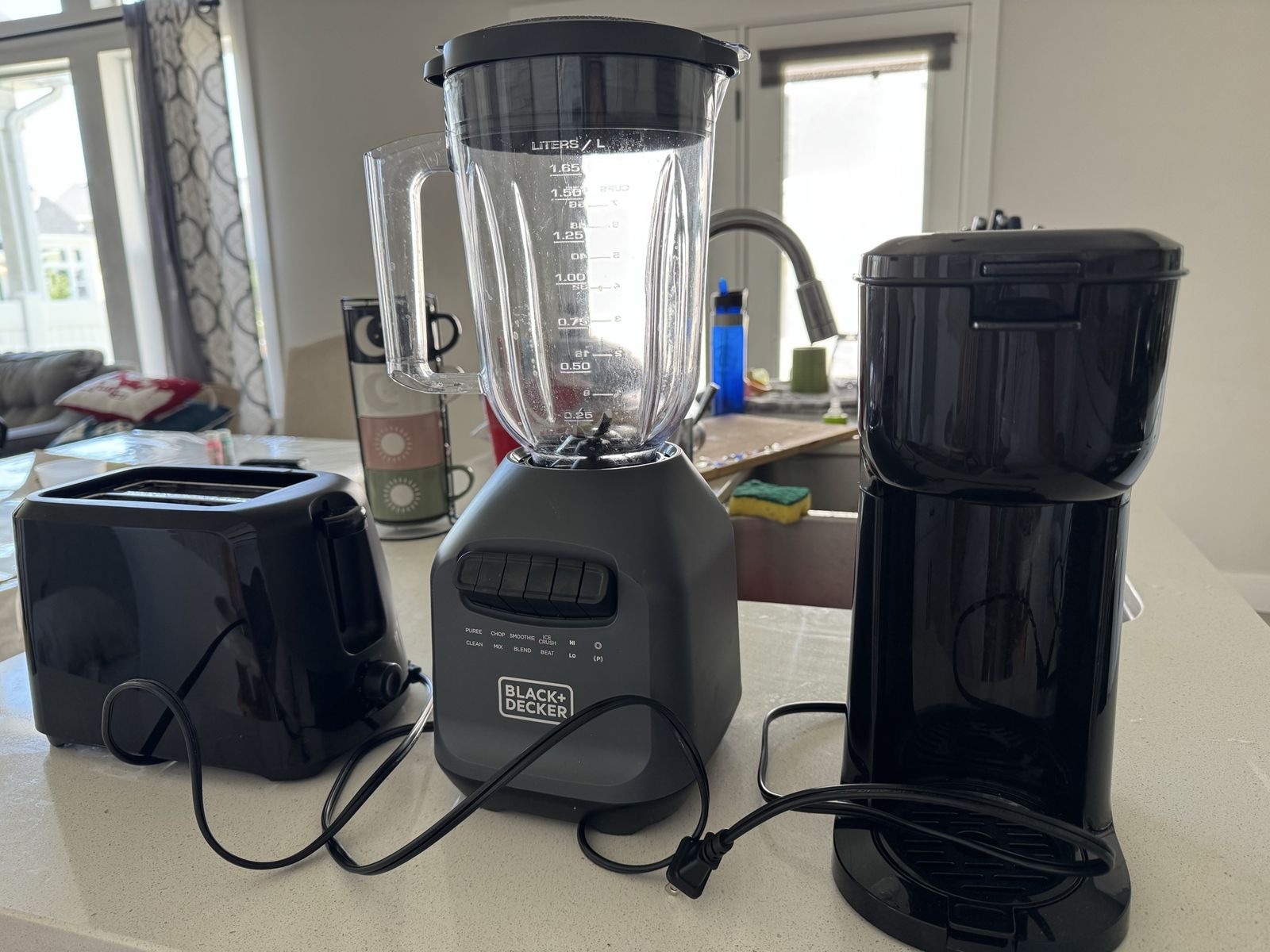 Kitchen small appliances toaster, blender and coffee machine