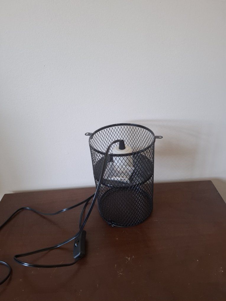 Wire cage for Reptile basking bulb or heat emitter. I paid $22 never ended up installing it. 