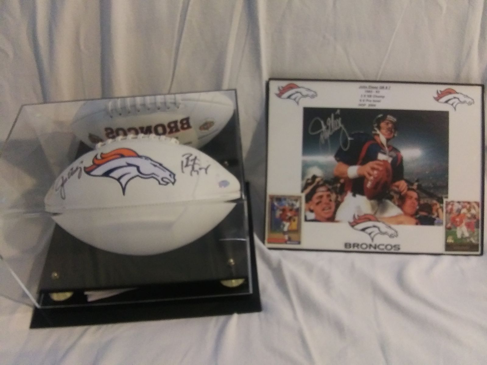 John Elway & Peyton Manning Signed Football.