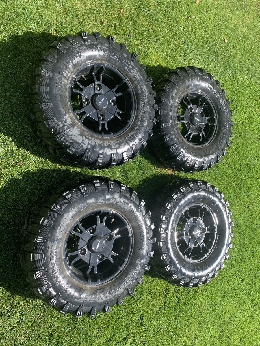 2025 Polaris Ranger Crew XP 1000 stock 14 inch rims (set of 4). Tires are free and have some life left in them