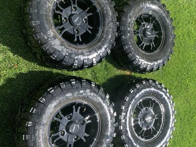 2025 Polaris Ranger Crew XP 1000 stock 14 inch rims (set of 4). Tires are free and have some life left in them