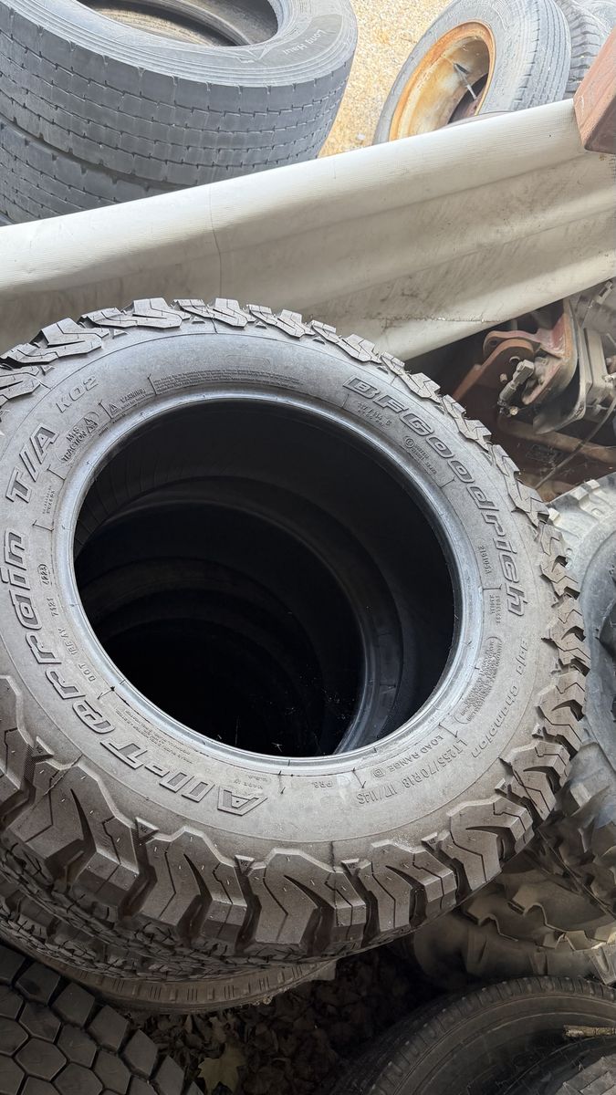 4 - BFGoodrich All-Terrain T/A KO2 LT255/70R18 Load Range D Truck Tire - Good Tread