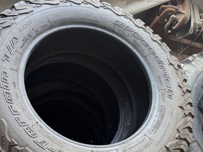 4 - BFGoodrich All-Terrain T/A KO2 LT255/70R18 Load Range D Truck Tire - Good Tread