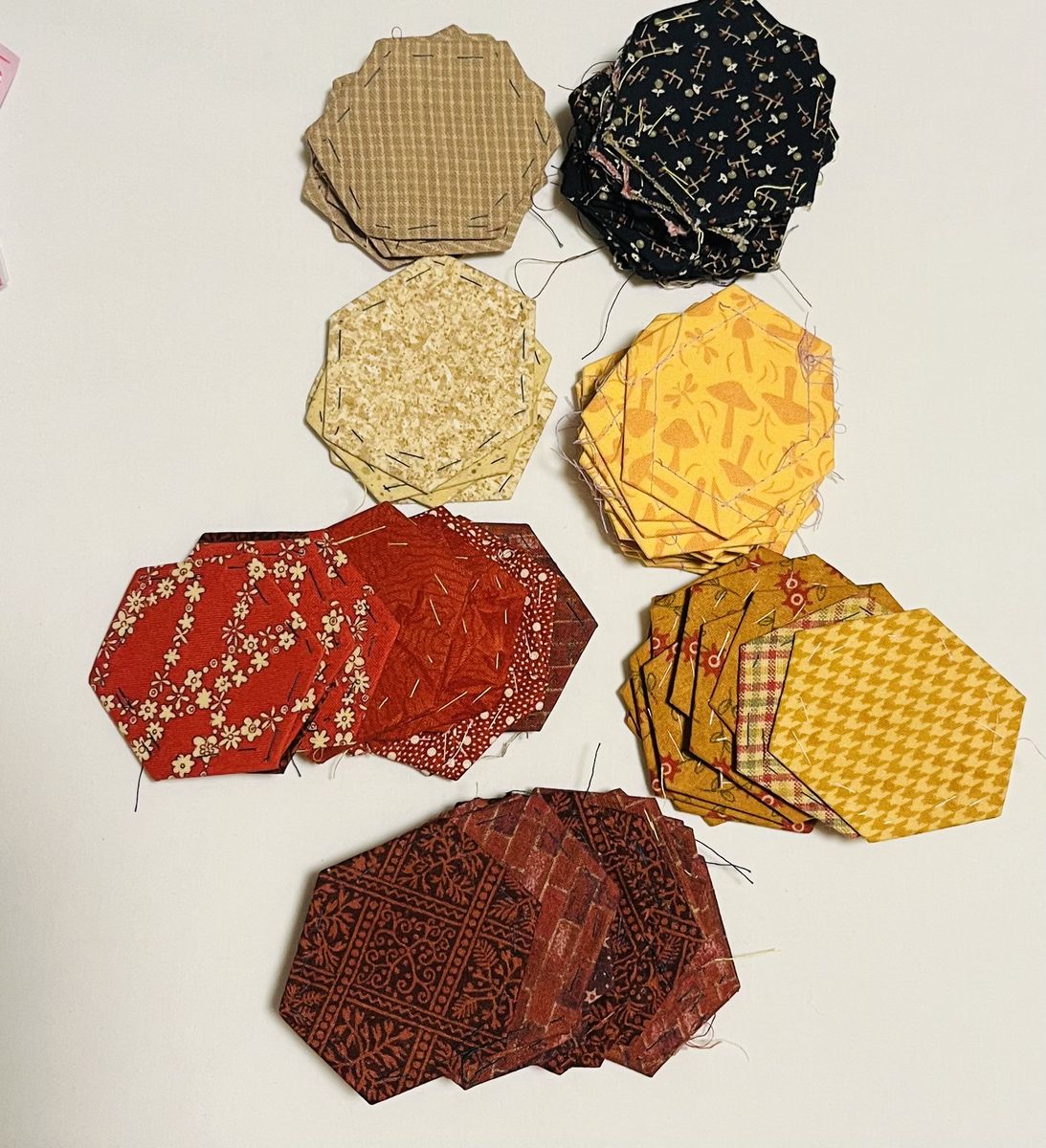 88 completed hexies with cardboard still attached