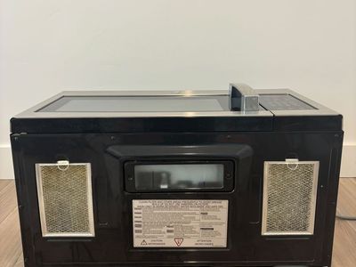 GE® 1.6 Cu. Ft. Over-the-Range Microwave Oven with Recirculating Venting