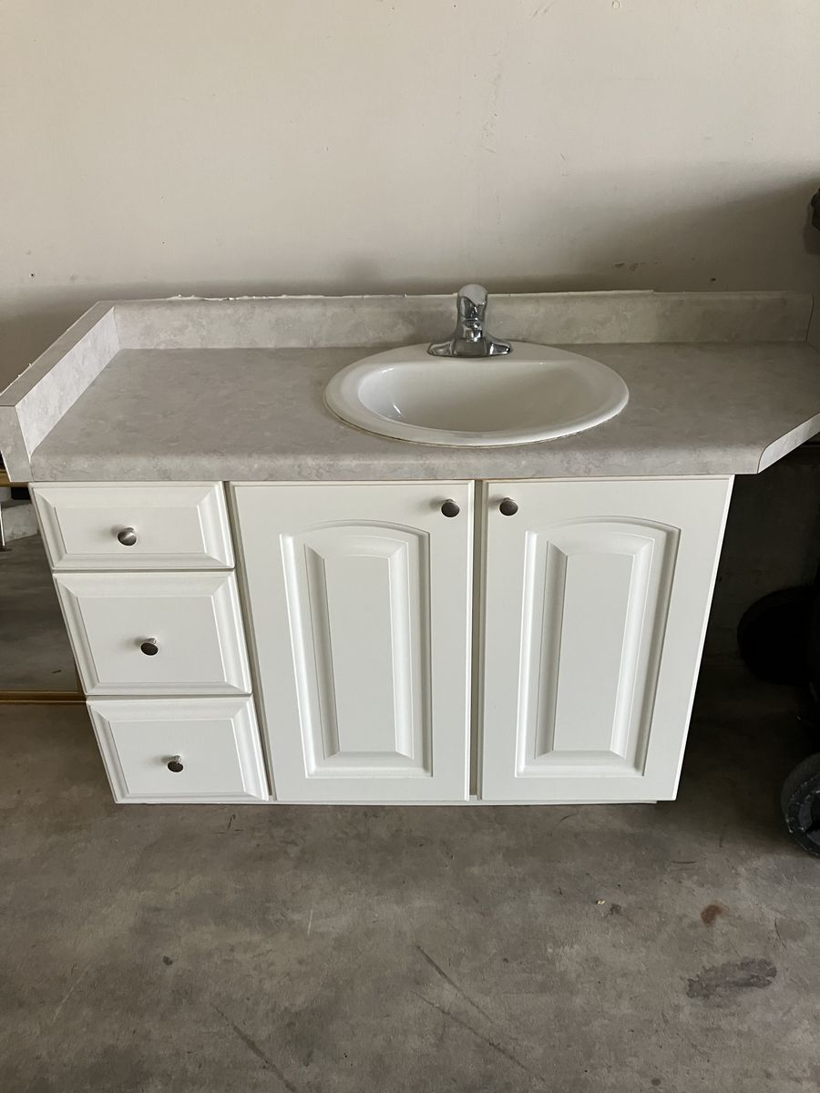 FREE--White Bathroom Vanity Cabinet with Countertop, Sink, and Faucet