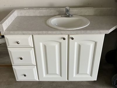 FREE--White Bathroom Vanity Cabinet with Countertop, Sink, and Faucet