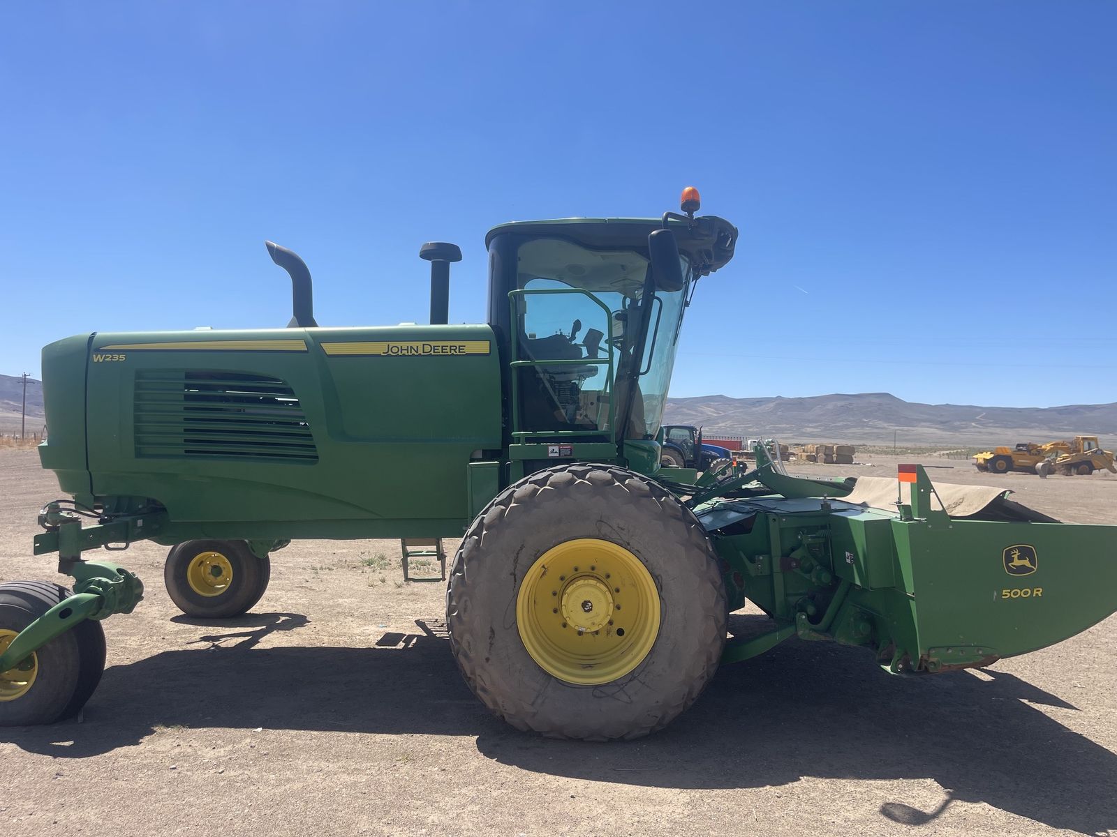 2015 JD W235R rotary swather