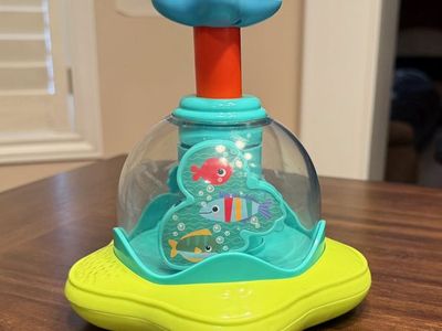 Bright Starts Press and Glow Infant Child Spinner Toy