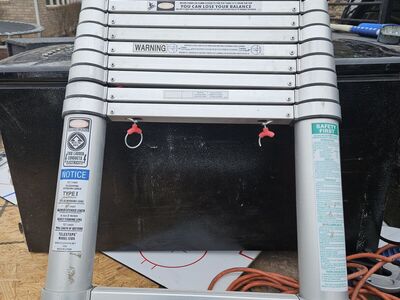 Telescoping twelve foot ladder