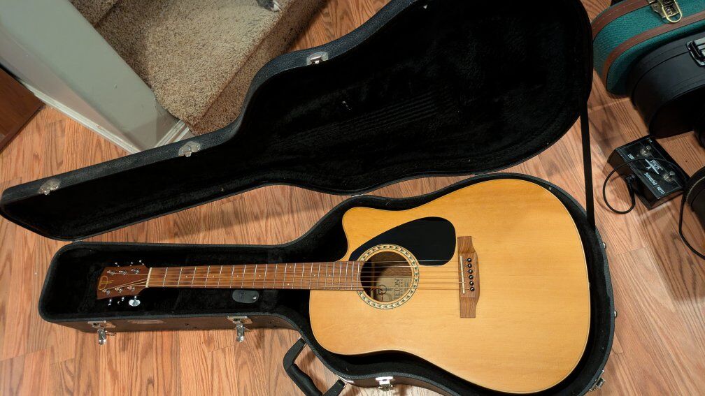 mint Teton acoustic guitar with case. ready to go