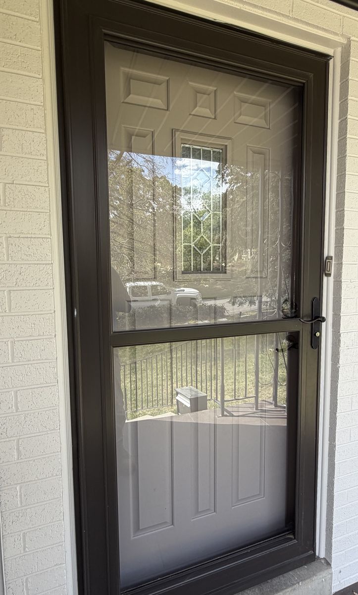 Glass storm door