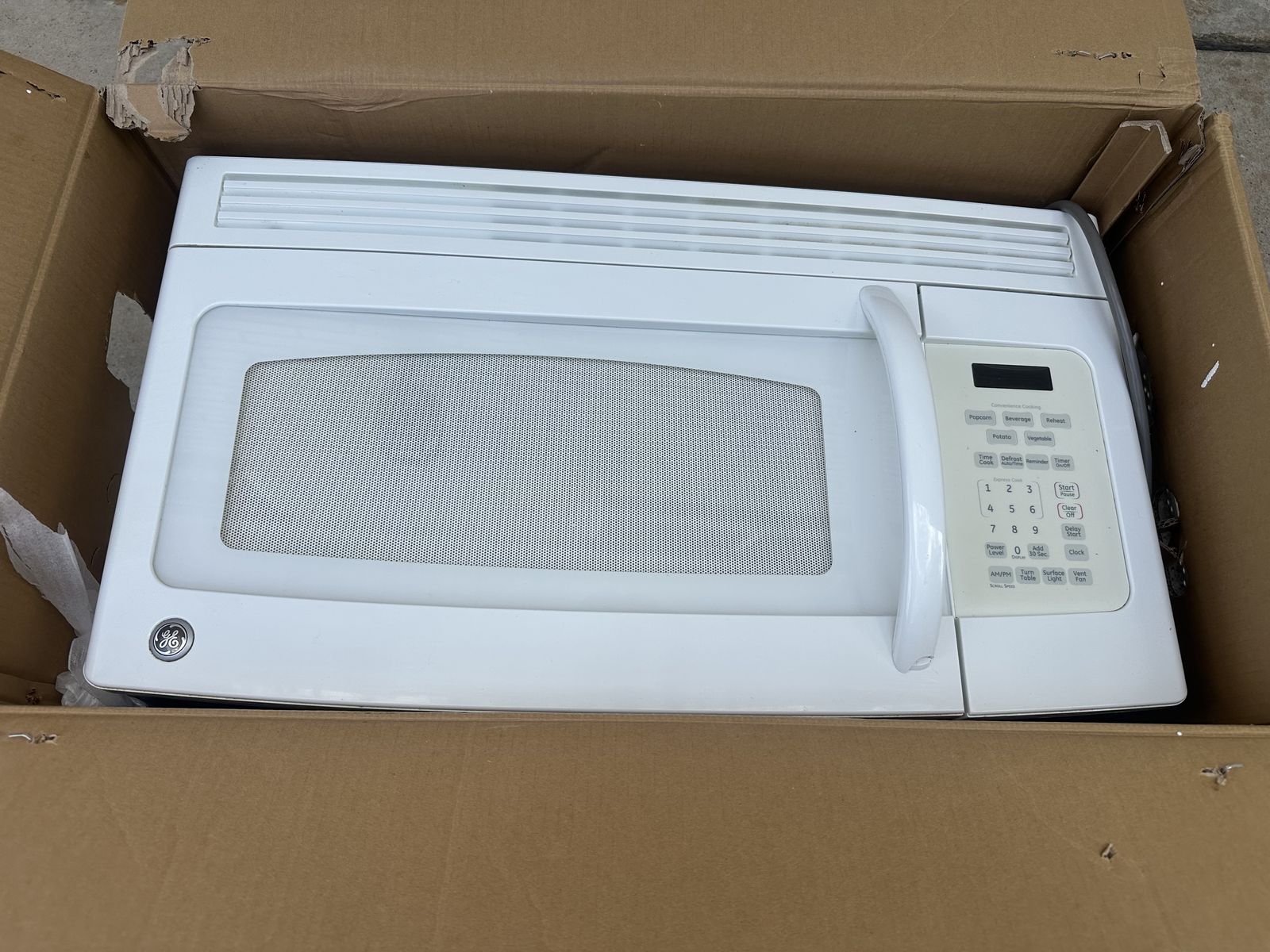 GE Over-the-Range Microwave in White