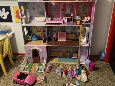 Large Barbie doll house and extras