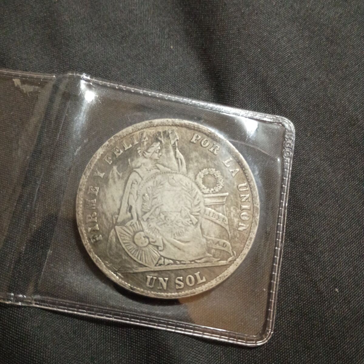 Peru silver dollar error