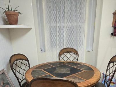 Dining room table, chairs and hutch set