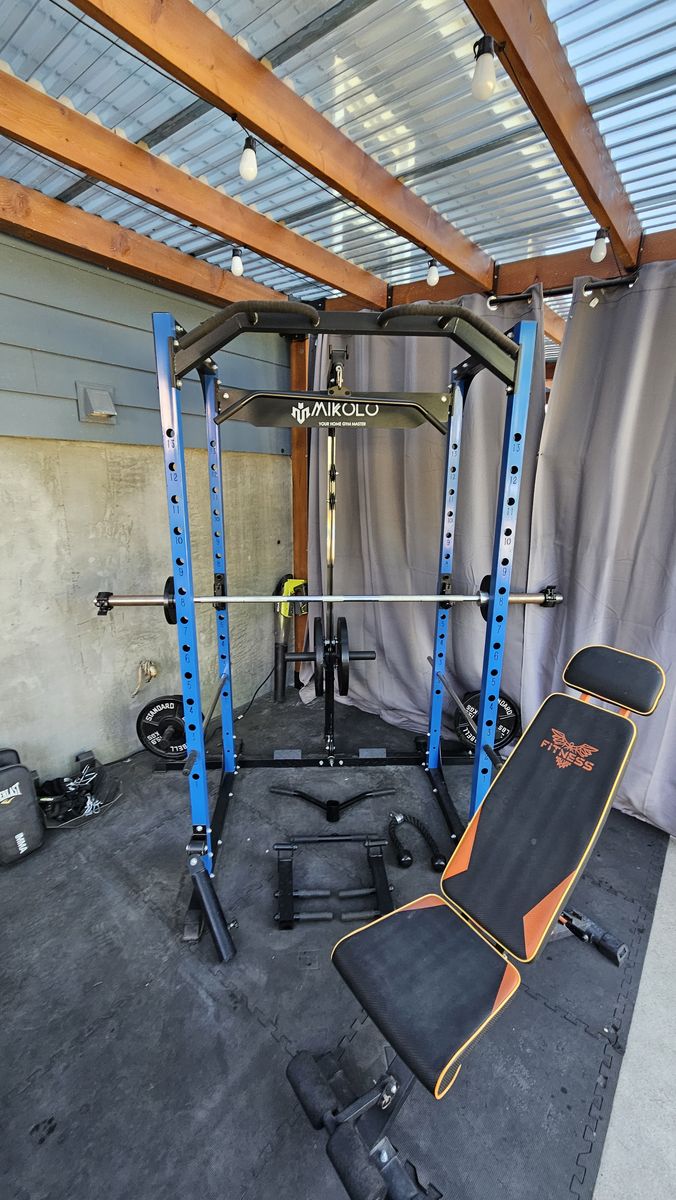 Mikolo Weight Rack w/ 265 lbs 2 inch Standard weights, 7 ft standard bar, and adjustable weight bench