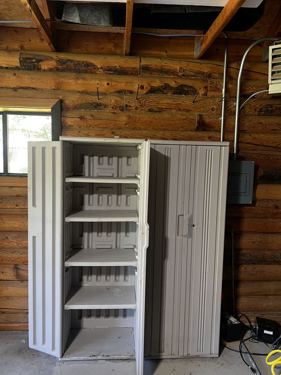 Two tall durable plastic storage cabinets very good condition