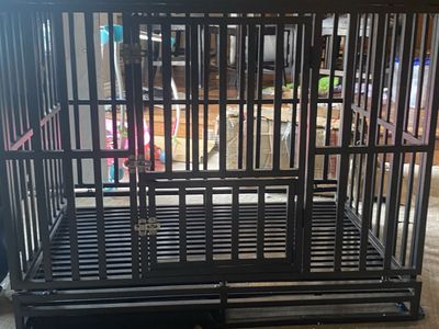 Dog crate/ cage with wheels and three doors