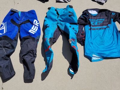 Fly Pants Size 30, Fly Jersey Size Medium, MSR Pants Size 30 and (3) sets of Oneal gloves size Medium