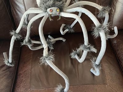 Big fluffy spider that can be hung 33” wide 17” tall