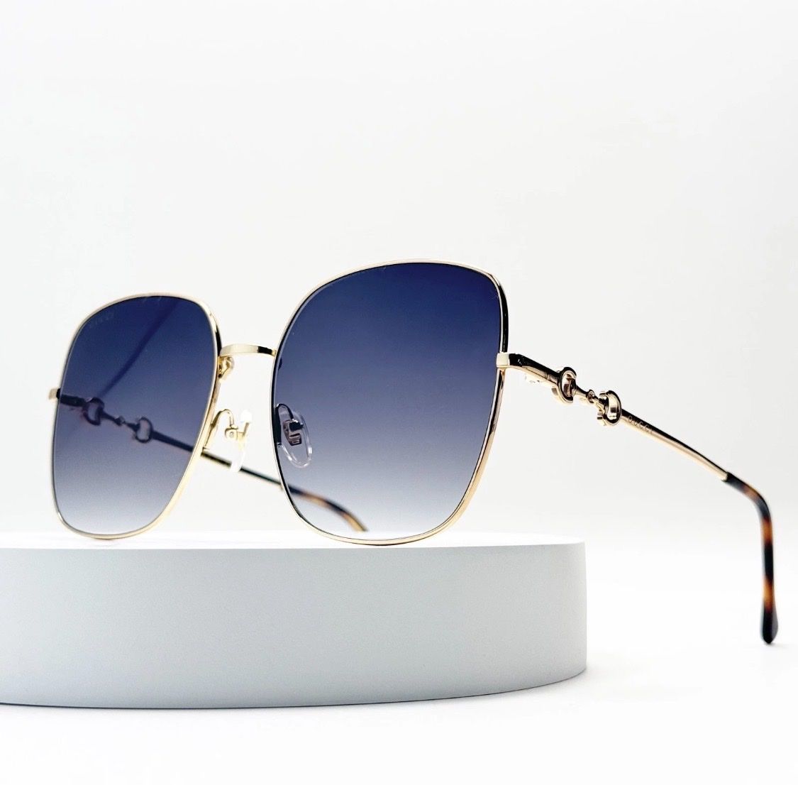 Gucci GG0879S Oversized Square Sunglasses Gold Frame Blue Gradient Lens